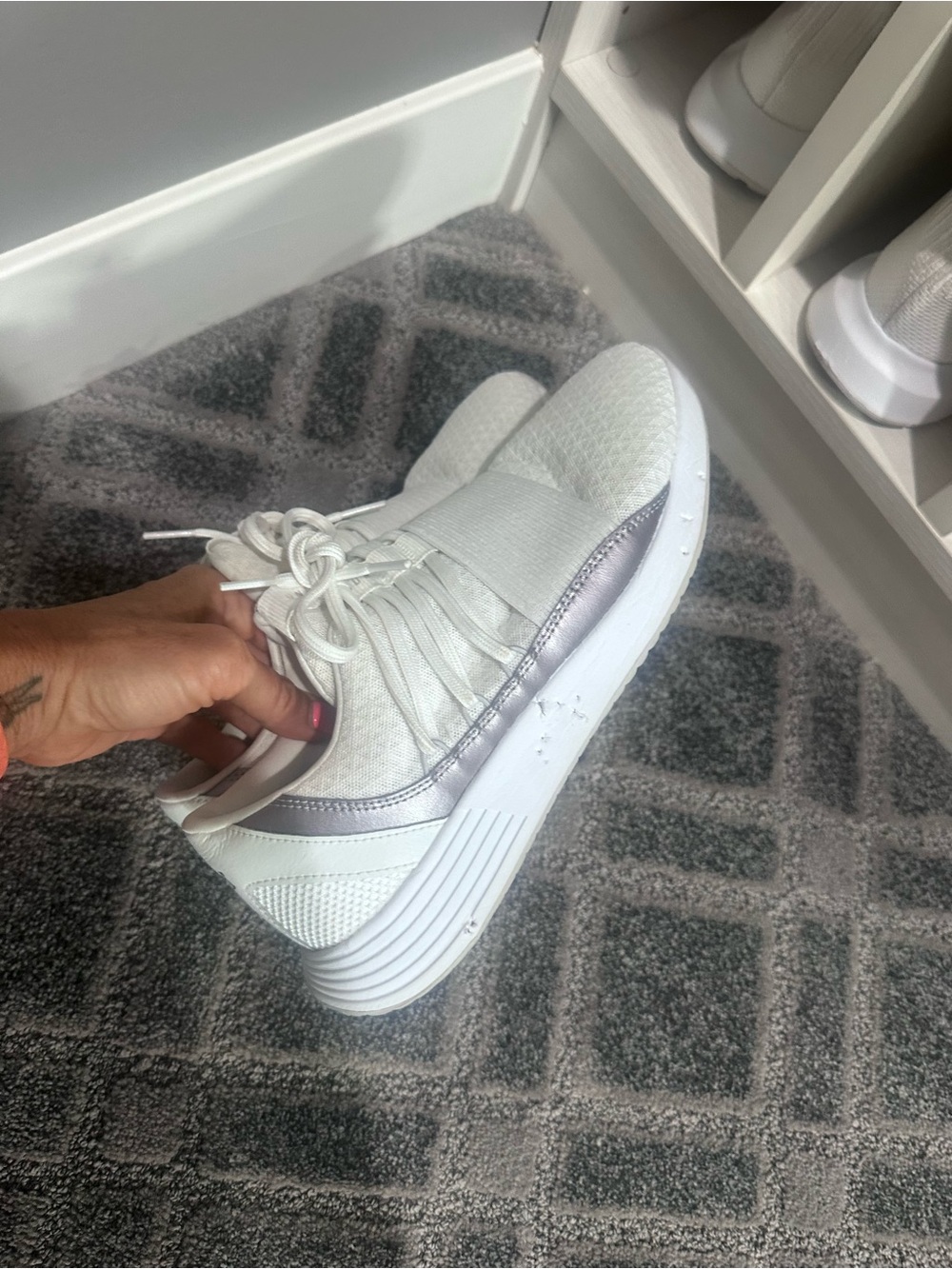 Under Armour Women’s White Athletic Lace-Up Slip-On Sneaker with Silver Accent